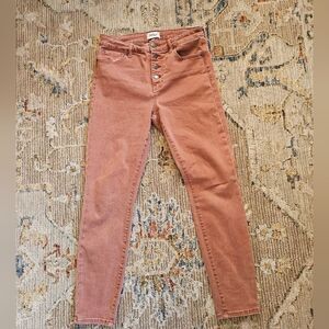 Pistola buttonfly sz 29 with 27" inseam.  Color is like a mauvish rust color